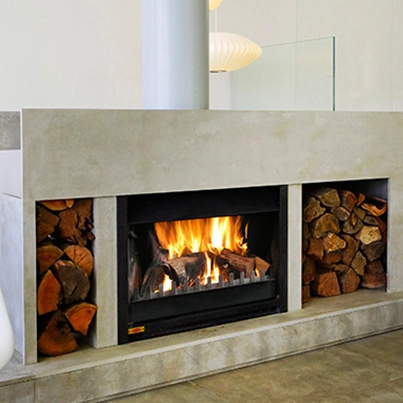 Concrete fireplace with wood storage