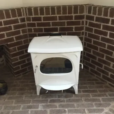 Vintage style white enamel fireplace | Woodpecker